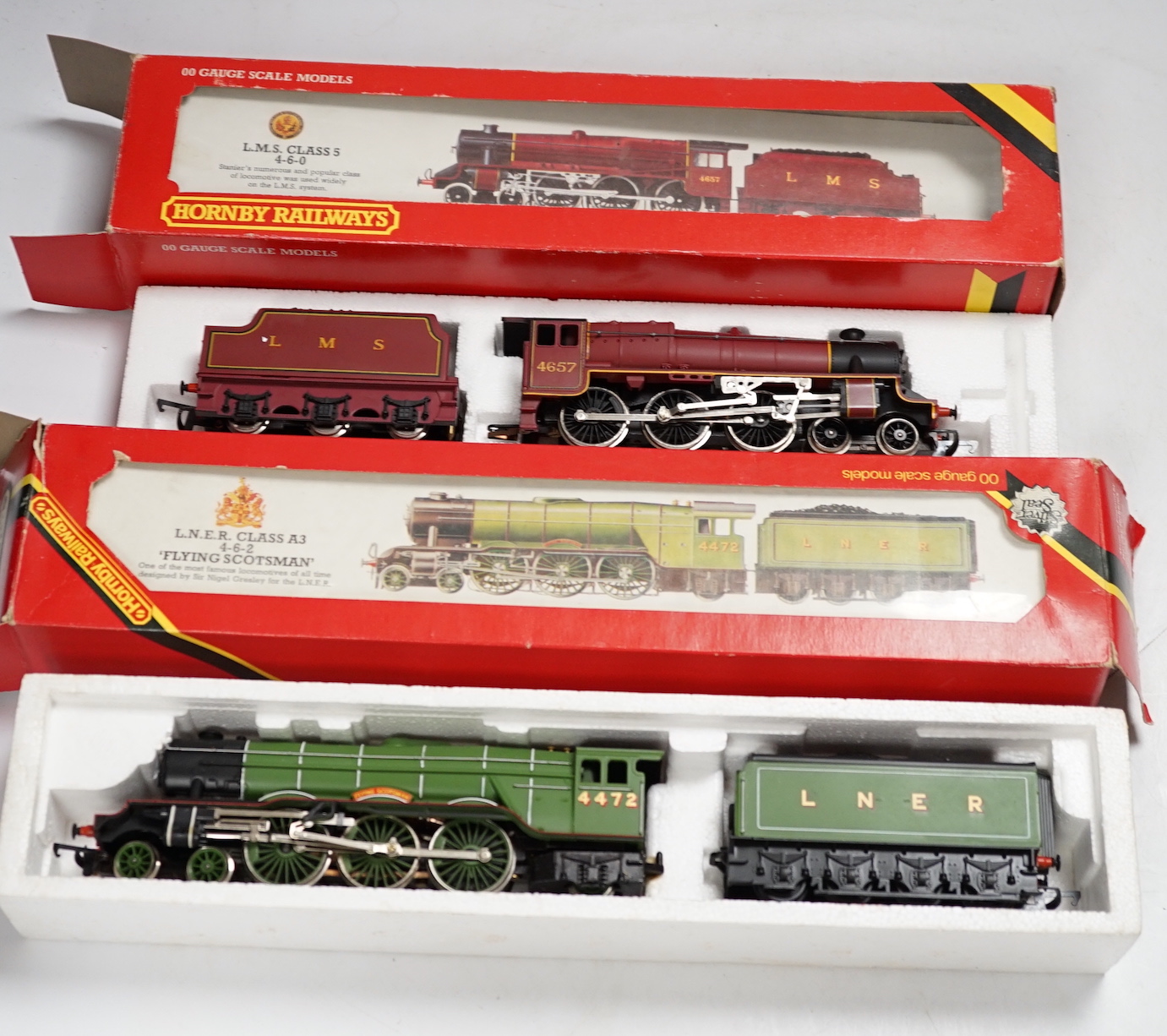 Five boxed Hornby Railways 00 gauge locomotives including; an LMS Black Five (R840), an LMS Class Five (R842), a BR Class 9F (R065), an LNER Class A3 (R 855), and a BR Class 3F (R058)